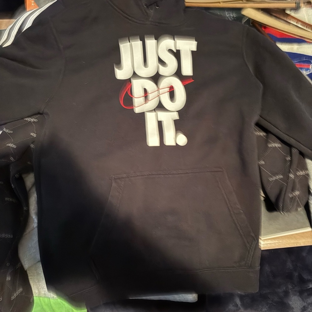 Nike Men's Black Hoodie with 'Just Do It' Graphic